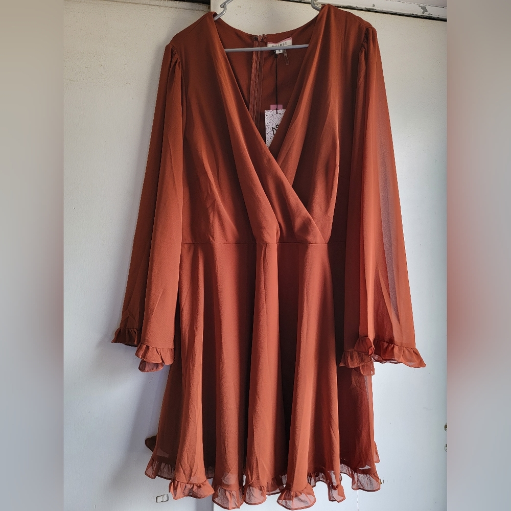 Beautiful rust colored faux wrapped style dress